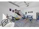 Finished garage features games and bike at 925 Conch Rd, Davenport, FL 33896