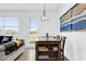 Bright living area offers backyard access, seamlessly connecting indoor and outdoor spaces at 925 Conch Rd, Davenport, FL 33896