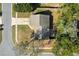 Aerial view of a single-Gathering home showcasing the roof, driveway, walkway, and surrounding yard and landscaping at 103 N Atlas Dr, Apopka, FL 32703