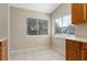 Cozy kitchen nook with tile floors and bright windows at 103 N Atlas Dr, Apopka, FL 32703