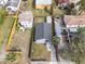 Aerial view of a cozy home with a well-maintained roof and fenced-in backyard at 109 Mcquigg Ave, Orlando, FL 32805