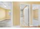 Hallway leading to bedroom, bathroom and laundry space at 109 Mcquigg Ave, Orlando, FL 32805