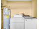 Laundry area with washer, dryer, and water heater at 109 Mcquigg Ave, Orlando, FL 32805