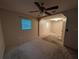 Large bedroom featuring neutral walls, carpet flooring, and a ceiling fan at 110 Kasey Dr, Orlando, FL 32807