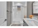 Bathroom featuring subway tile surround and decorative tile floor design at 11507 Center Lake Dr, Windermere, FL 34786