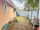 Side yard featuring a privacy fence, landscaping, and room to set up a private oasis at 14410 Sw 79Th Ter, Ocala, FL 34473