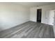 Neutral bedroom with gray vinyl floors, offering a blank canvas for personalization at 171 Marion Oaks Trl, Ocala, FL 34473