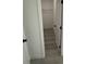 Walk-in closet with wire shelving; accessed by a door with black hardware at 171 Marion Oaks Trl, Ocala, FL 34473