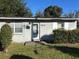 Close up of the home's front exterior featuring the address and front door at 1805 Riley Ave, Orlando, FL 32805