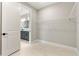 Spacious walk-in closet located off the bathroom with wire shelving at 1809 Simonton Ave, Orlando, FL 32806