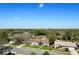 Overhead shot of neighborhood featuring a well-maintained home and picturesque surroundings at 207 Pembrook Pl, Longwood, FL 32779