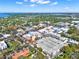 Aerial view of downtown with mixed-use buildings, parking lots, and neighborhood trees at 234 N Lakeview Ave, Winter Garden, FL 34787