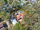 Aerial view of the property showcasing its mature trees, pool, playground, and expansive layout at 234 N Lakeview Ave, Winter Garden, FL 34787