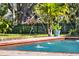 A close up on pool fountains, which are surrounded by lush greenery at 234 N Lakeview Ave, Winter Garden, FL 34787