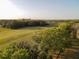 Scenic aerial view of community and golf course, showcasing the building's beautiful surroundings at 2600 Robert Trent Jones # 934, Orlando, FL 32835