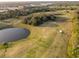 Panoramic aerial view of the community's golf course with lush greenery and various water features at 2600 Robert Trent Jones # 934, Orlando, FL 32835