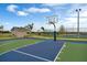 Modern community basketball court near a small building and playground at 2676 Gouda Dr, Apopka, FL 32703