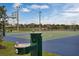 Community basketball court and drinking fountain, with nearby seating and landscaping at 2680 Gouda Dr, Apopka, FL 32703