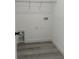 The laundry room features wire shelving and washer/dryer hookups at 2703 Sw 162Nd Street Rd, Ocala, FL 34473