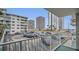 Balcony view showcasing beachfront condo buildings and parking at 2727 N Atlantic Ave # 2020, Daytona Beach, FL 32118