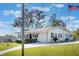 Charming single-story home featuring dark shutters, an attached one-car garage and well-kept landscaping at 29 Jasmine Dr, Debary, FL 32713