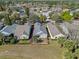 Aerial view of home featuring a fully fenced backyard, lush landscaping, and a serene neighborhood at 300 Stonington Way, Deland, FL 32724