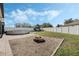 Spacious backyard features a fire pit, above ground pool, and play structure at 3223 Queen Alexandria Dr, Kissimmee, FL 34744