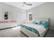 Bright bedroom with a full bed and a closet at 3223 Queen Alexandria Dr, Kissimmee, FL 34744