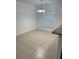 Bright dining room with tile flooring and a modern chandelier at 424 Crabtree Ave, Orlando, FL 32835