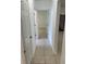 Hallway featuring tile flooring and a view of the next room at 424 Crabtree Ave, Orlando, FL 32835