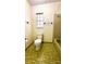 Full bathroom featuring a toilet, window, and shower/tub combination at 5339 Cypress Dr, Winter Park, FL 32792