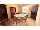 Traditional dining room with a wooden table, chairs, and built-in cabinetry at 5339 Cypress Dr, Winter Park, FL 32792