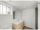 Modern bathroom with a vanity, a large mirror, sleek fixtures, and a glass-enclosed shower at 662 Sausalito Blvd, Casselberry, FL 32707