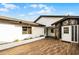 Charming home with a stone accent wall and a wooden deck, adding character and curb appeal at 662 Sausalito Blvd, Casselberry, FL 32707