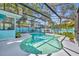 Inviting screened-in pool area featuring a uniquely shaped pool and comfortable lounge seating at 721 Glenridge Way, Winter Park, FL 32789