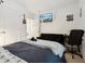 Bedroom featuring a sofa, carpeted floor, a desk, and a modern decor at 841 Benjamin Trl, Davenport, FL 33837