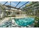 The spacious pool and pool deck are perfect for entertaining and relaxation at 9332 Windy Ridge Rd, Windermere, FL 34786