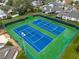 Aerial view of well-maintained tennis courts at 978 Cobbler Ct, Longwood, FL 32750