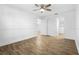 Bedroom with wood-look tile floors and a ceiling fan at 1149 Doyle Rd, Deltona, FL 32725
