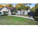 Charming one-story home featuring well-manicured landscaping and a covered porch at 1149 Doyle Rd, Deltona, FL 32725