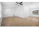 Spacious living room featuring tile flooring, neutral walls and ceiling fan at 1149 Doyle Rd, Deltona, FL 32725