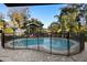 Inviting fenced pool with a brick paver deck, great for entertaining and enjoying the Florida sunshine at 1149 Doyle Rd, Deltona, FL 32725