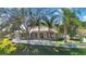 Spacious backyard with lush lawn, fenced in with a patio and fire pit at 11706 Regal Ridge Ln, Clermont, FL 34711