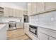 Well-appointed kitchen featuring stainless steel appliances, sleek countertops, and contemporary cabinetry at 11706 Regal Ridge Ln, Clermont, FL 34711