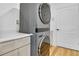 Laundry room features stacked washer and dryer at 11706 Regal Ridge Ln, Clermont, FL 34711
