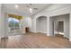Spacious bedroom with vaulted ceilings, wood floors, and a private balcony entrance at 12008 Villanova Dr # 112, Orlando, FL 32837