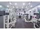 Well-equipped gym with various weight machines and exercise equipment at 12008 Villanova Dr # 112, Orlando, FL 32837