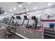 Exercise room with treadmills, elliptical machines, and free weights for residents at 12008 Villanova Dr # 112, Orlando, FL 32837