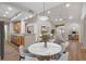 Bright living room with stainless steel appliances, dining area, and home office with a view at 12008 Villanova Dr # 112, Orlando, FL 32837