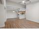 Open living space featuring wood floors, a kitchen with stainless steel appliances and dining area at 12008 Villanova Dr # 112, Orlando, FL 32837
